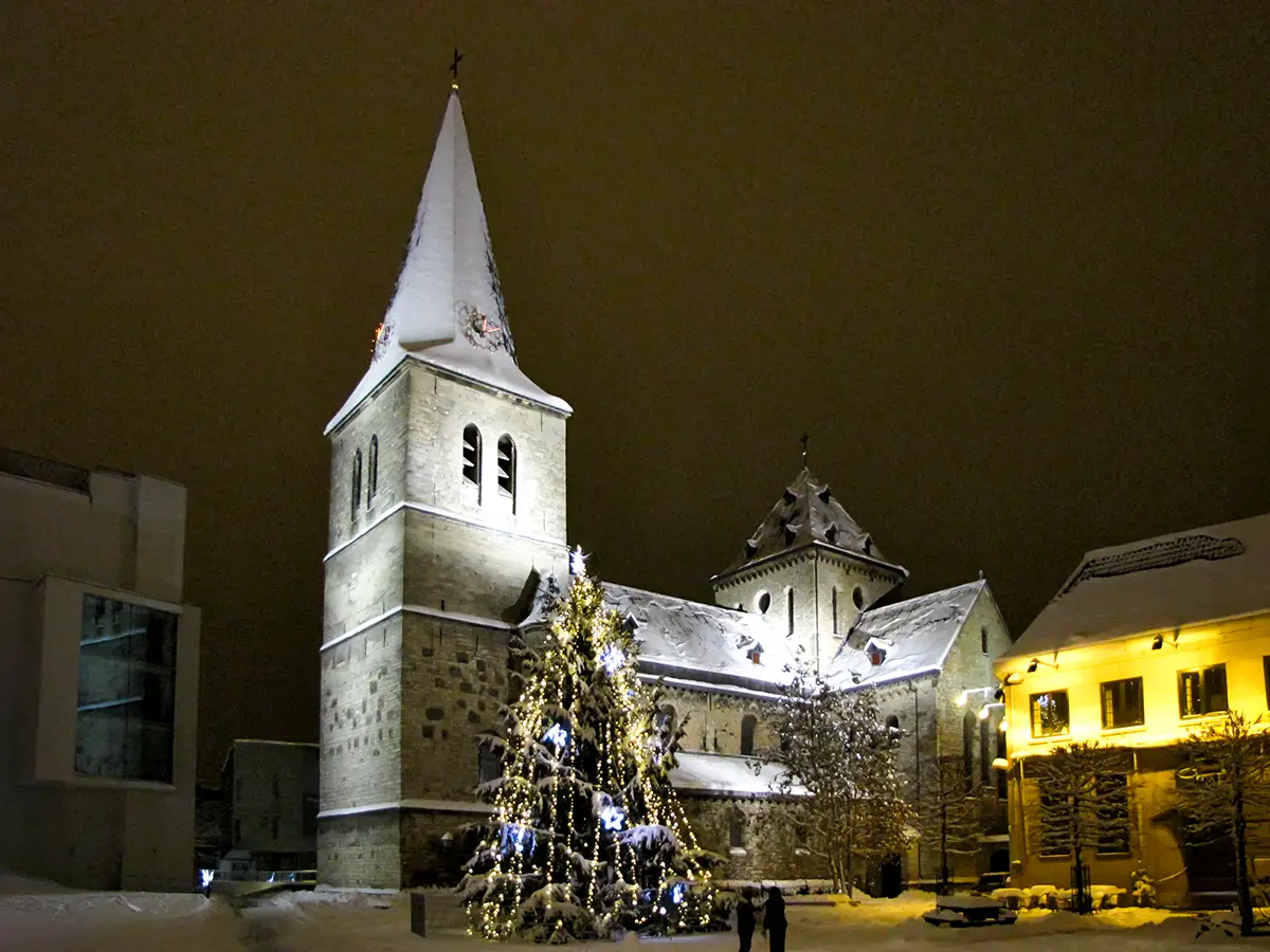 The historic Sint Pancratiuskerk in Heerlen, reflecting the European roots of Atelier Nativitas